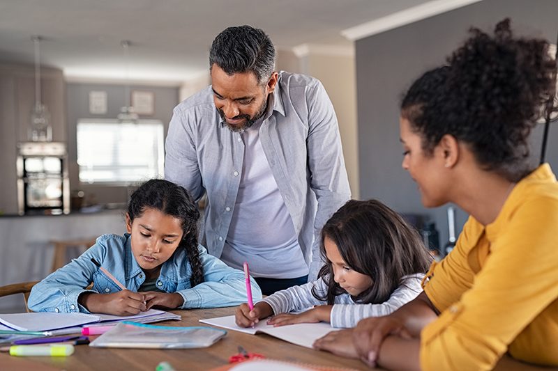 Parents helping students with school work