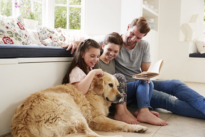 Dad reading with kids